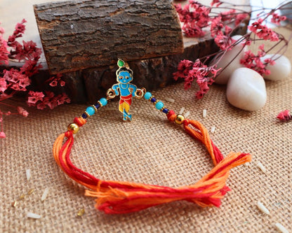 Kamule Metal Krishna Beads Embellished Rakhi For Brother - Sky Blue