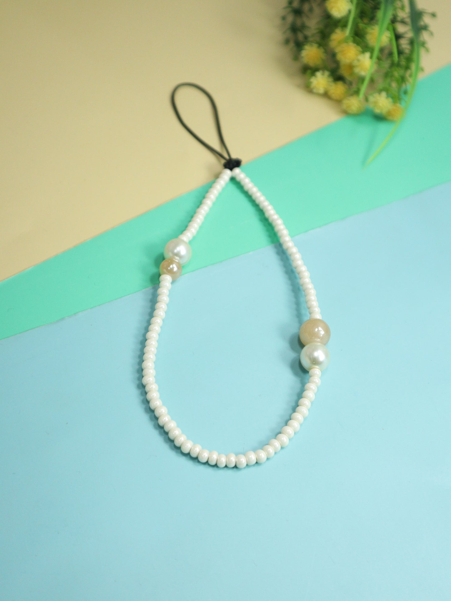 Kamule Seeds Cream Beads Phone Charm