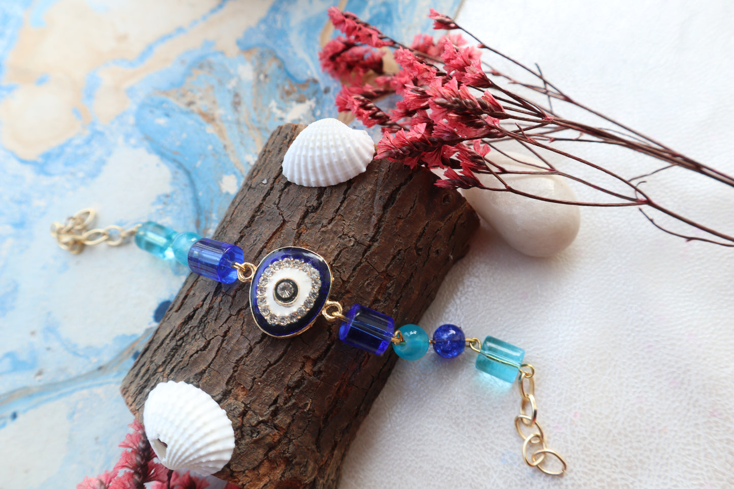 Kamule Evil Eye Diamond Stone Embellished Rakhi - Blue