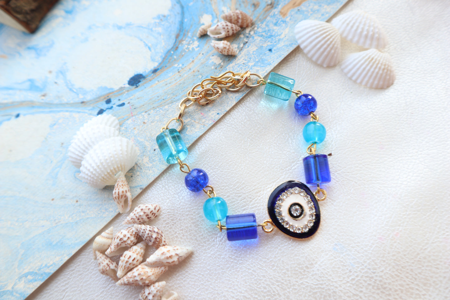 Kamule Evil Eye Diamond Stone Embellished Rakhi - Blue