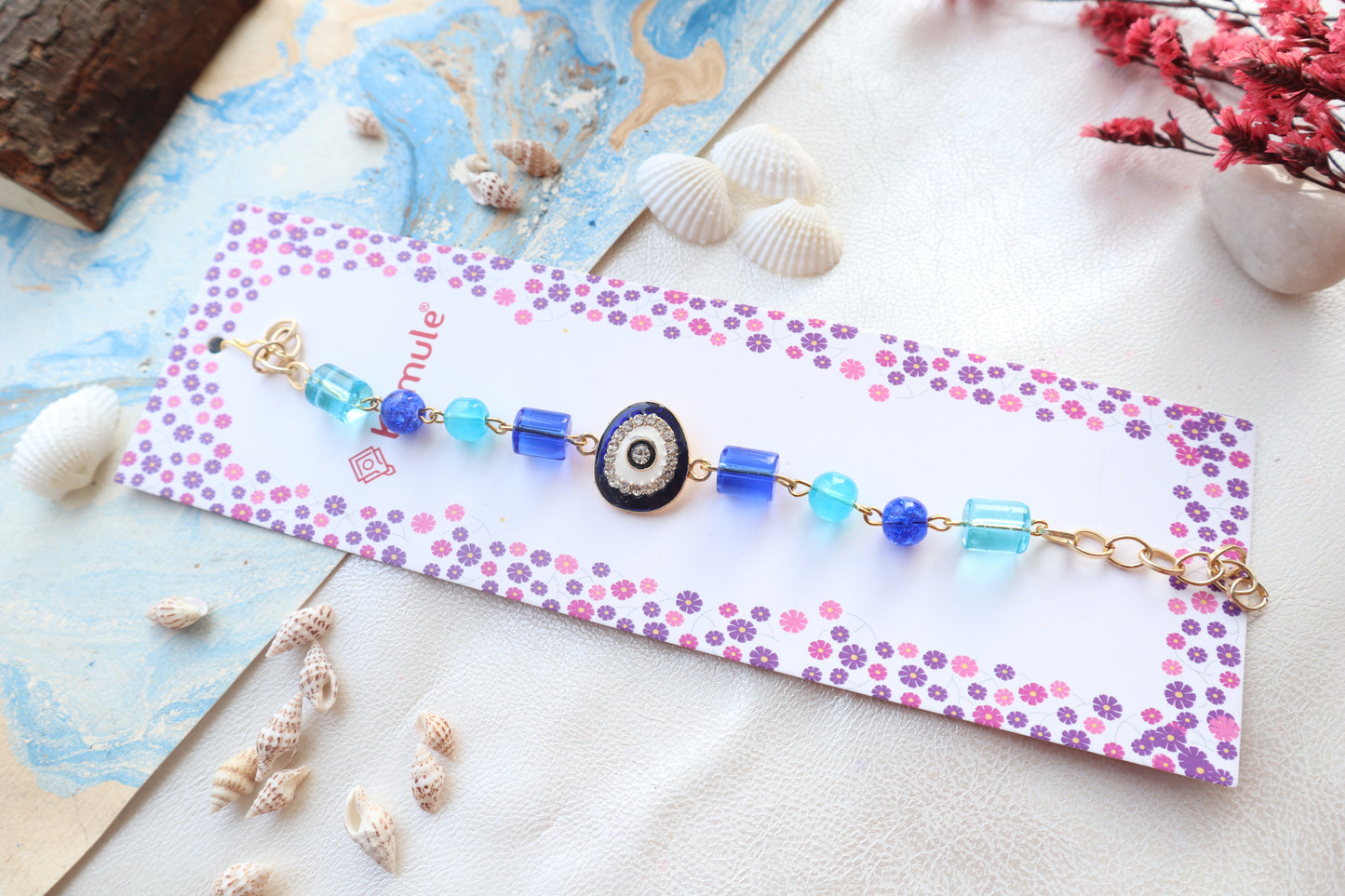 Kamule Evil Eye Diamond Stone Embellished Rakhi - Blue