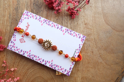 Kamule Radiant Flame Om and Sacred Rudraksha Rakhi - Orange