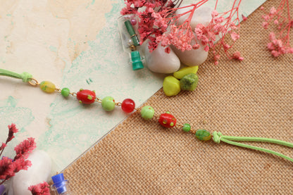 Kamule Lampwork Beaded Rakhi-Green and Red