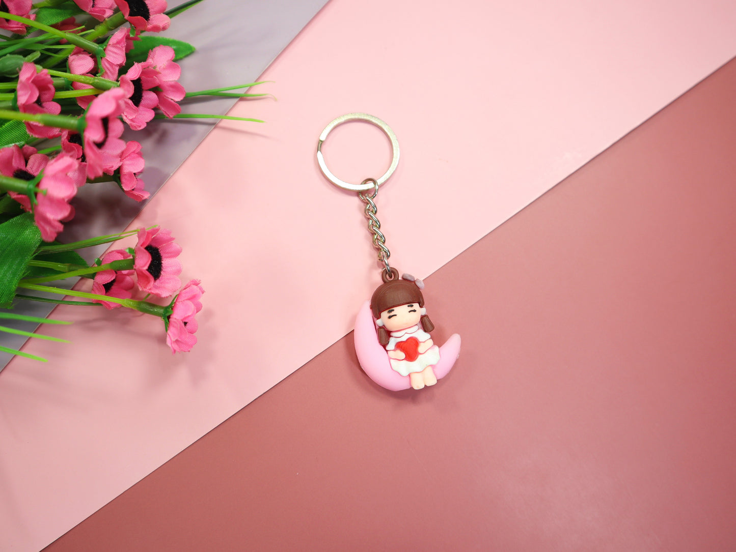 Cute Girl seitting on The Moon Pink Keychain