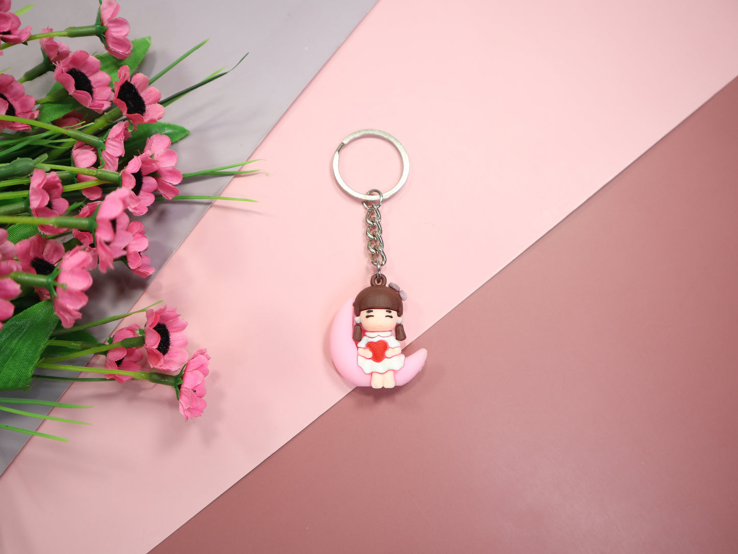 Cute Girl seitting on The Moon Pink Keychain