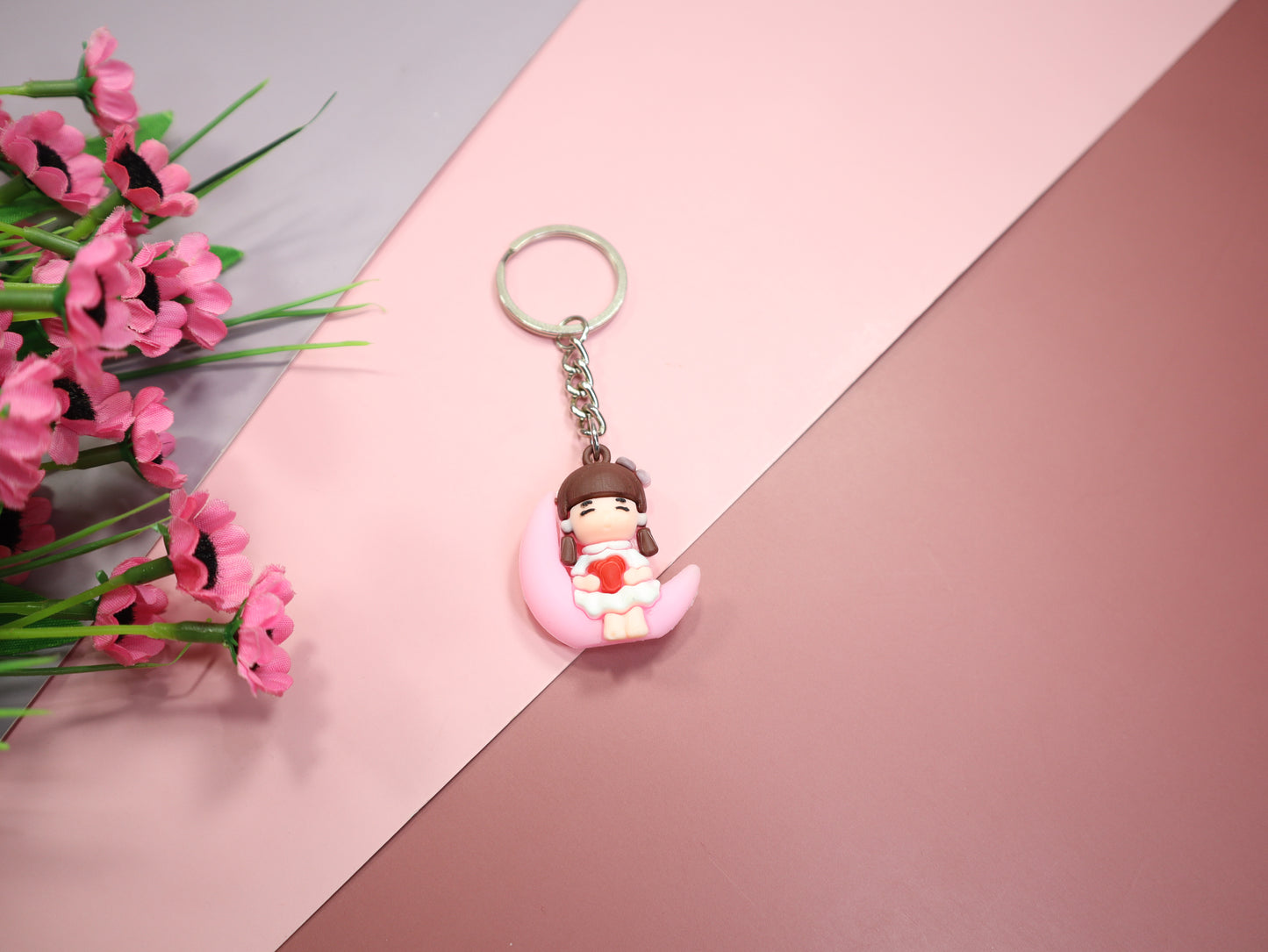 Cute Girl seitting on The Moon Pink Keychain